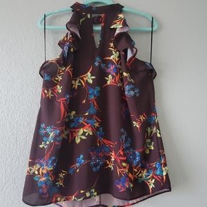 Black floral print sleeveless blouse